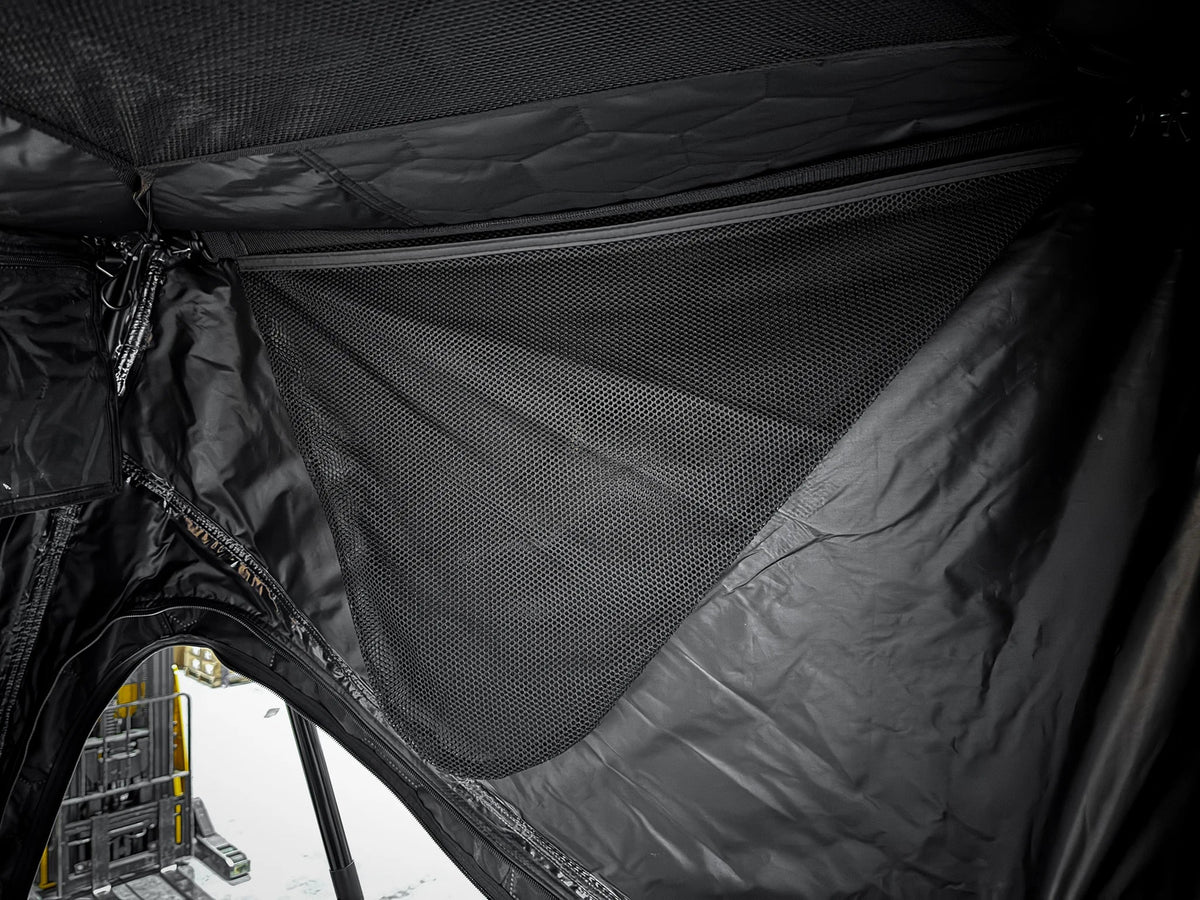 Evolution XL rooftop tent — Interior pocket hanging